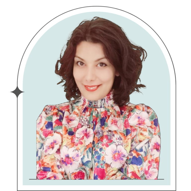 A picture of Setareh who is an hypnotherapist with a colorful floral patterned blouse portrait.
